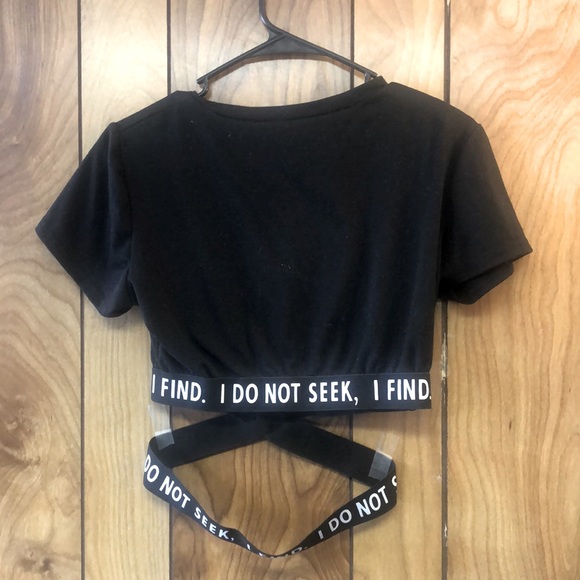 Like new, worn twice. “I do not seek, I find.” Black crop top - Picture 2 of 3